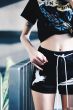 “Eleutheromania” White Strap Girl Shorts 2018